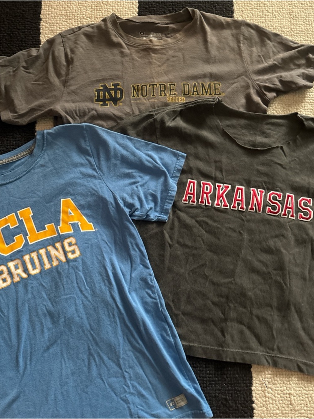 Three College T-shirts ~ UCLA, Notre Dame, and Arkansas